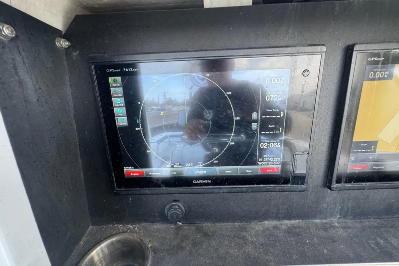Slide: The Image of Garmin GPS display on 2007 Contender 33 Tournament boat dashboard. - 36