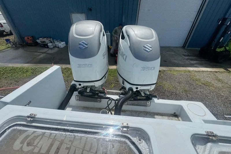 Slide: The Image of 2007 Contender 33 Tournament boat with dual Suzuki 350 outboard engines. - 21