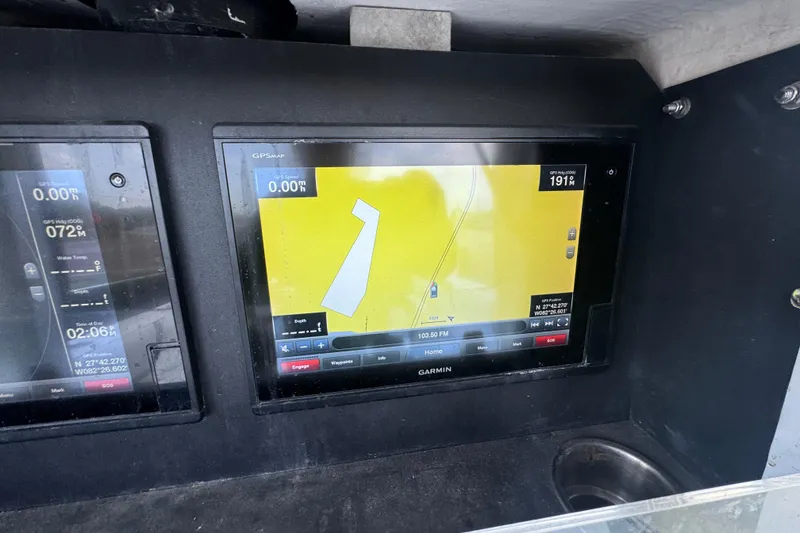 Slide: The Image of Garmin GPS display on 2007 Contender 33 Tournament boat dashboard. - 37