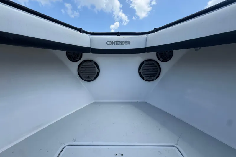 Slide: The Image of Interior view of a 2007 Contender 33 Tournament boat with speakers and clear sky. - 42