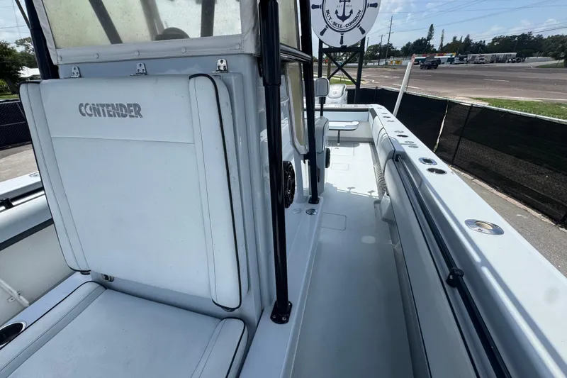 Slide: The Image of 2007 Contender 33 Tournament boat interior, showcasing seating and deck layout. - 56