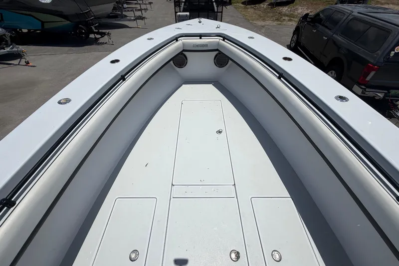 Slide: The Image of 2007 Contender 33 Tournament boat deck, spacious and well-maintained, ideal for fishing trips. - 20