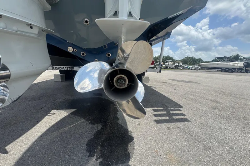 Slide: The Image of Propeller of a 2007 Contender 33 Tournament boat on a trailer, sunny day. - 7