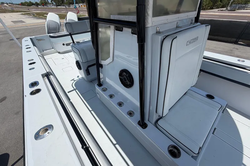 Slide: The Image of 2007 Contender 33 Tournament boat interior, featuring seating and storage compartments. - 25