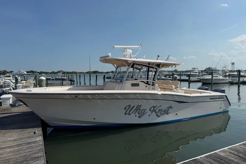 The Image of 2008 Grady-White Canyon 336 boat docked at marina, named "Why Knot." - 2