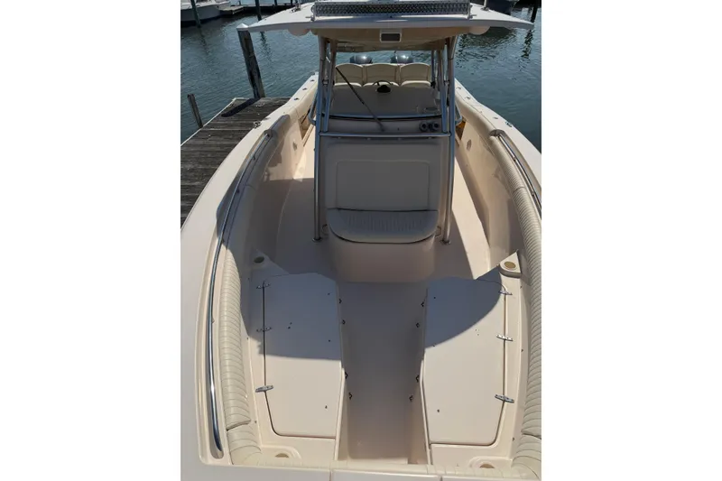 Slide: The Image of 2008 Grady-White Canyon 336 boat interior, featuring spacious seating and sleek design. - 6