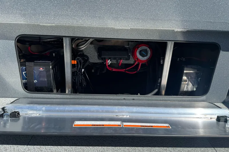 Slide: The Image of Battery compartment of 2027 KingFisher 2025 Escape HT boat, showcasing wiring and components. - 21