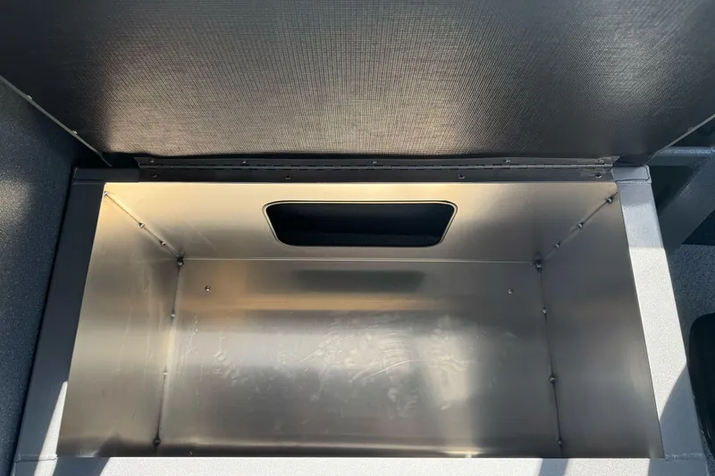 Slide: The Image of Storage compartment of KingFisher 2025 Escape HT boat, 2027 model, with metallic interior. - 25