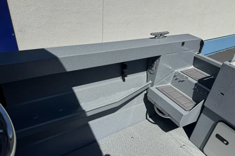 Slide: The Image of Interior view of a 2027 KingFisher 2025 Escape HT boat, showcasing control panels. - 16