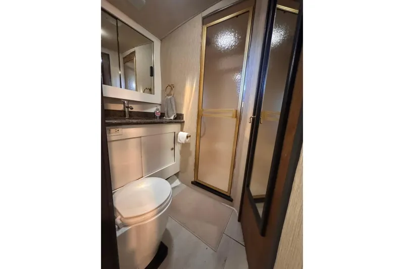 Slide: The Image of Bathroom interior of 1982 Sunliner Ocean Yachts with shower and vanity. - 53