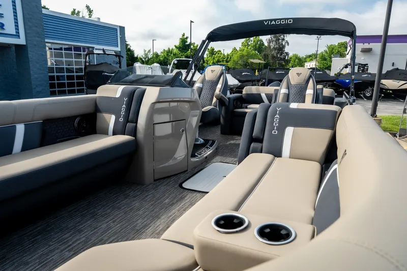 Slide: The Image of Luxurious 2026 Viaggio Z24S pontoon boat interior with plush seating and modern design. - 16