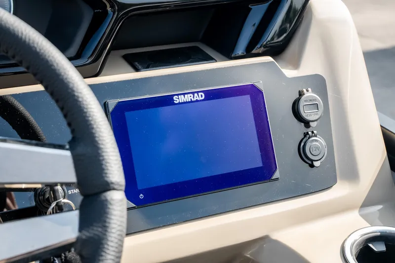 Slide: The Image of Dashboard of 2026 Viaggio Z24S featuring Simrad display and controls. - 24