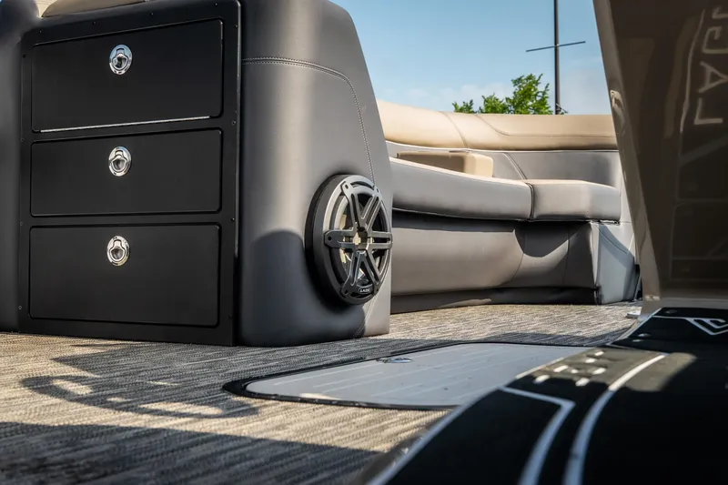 Slide: The Image of Interior of 2026 Viaggio Z24S boat with seating, speaker, and storage drawers. - 25