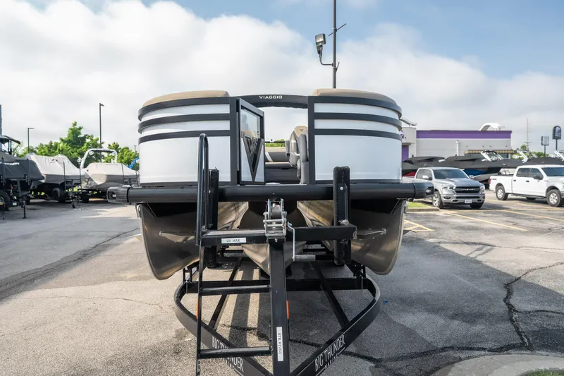 Slide: The Image of 2026 Viaggio Z24S pontoon boat on trailer in parking lot. - 3