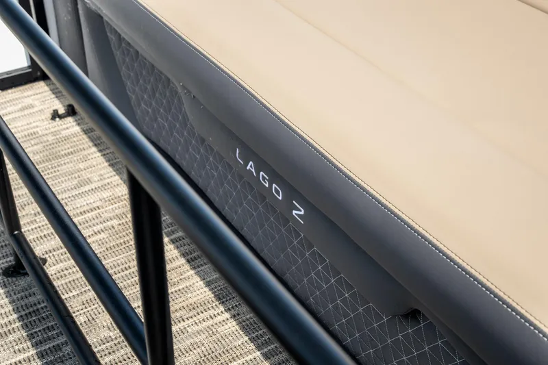 Slide: The Image of 2026 Viaggio Z24S boat seat with beige upholstery and black railing. - 30