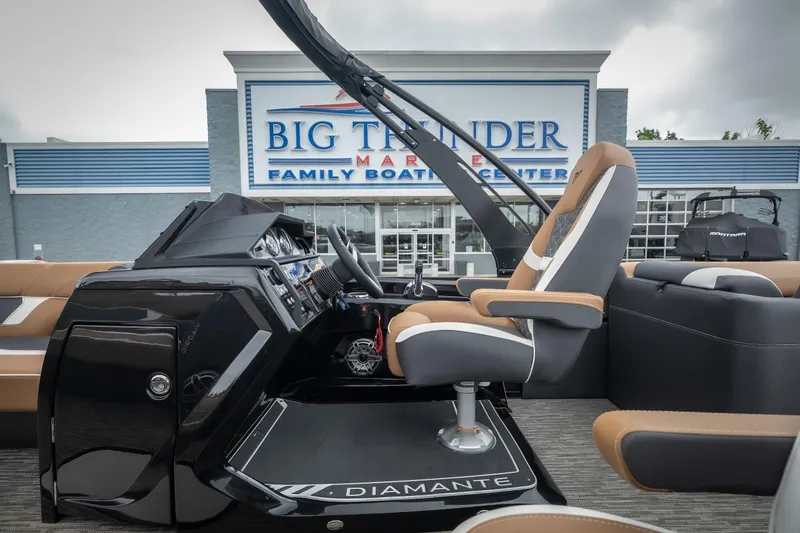 Slide: The Image of Viaggio Diamante UWA 26 boat interior at Big Thunder Marine, showcasing modern helm and seating. - 22