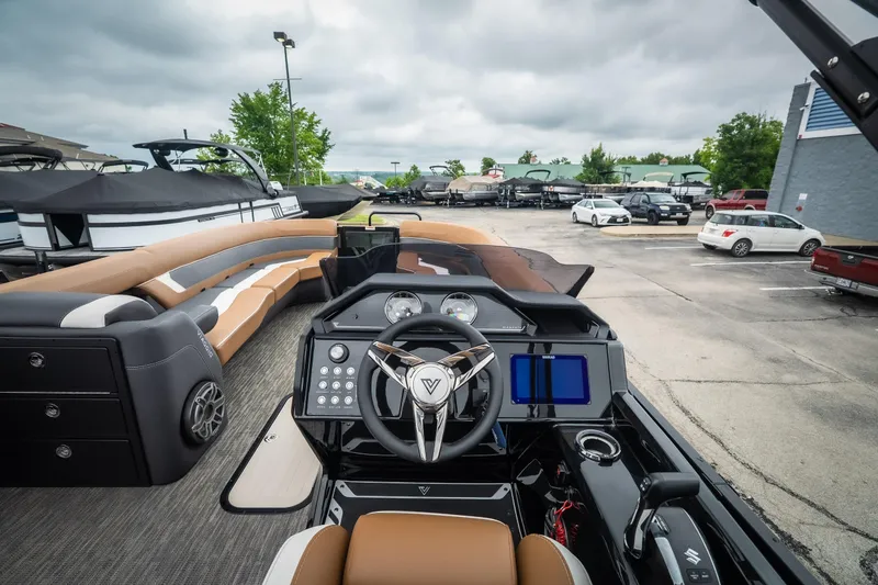 Slide: The Image of Interior view of 2026 Viaggio Diamante UWA 26 boat with modern dashboard and seating. - 26