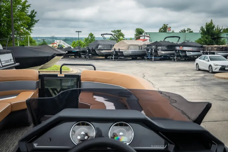 Slide: The Image of Interior view of a 2026 Viaggio Diamante UWA 26 boat at a dealership. - 27