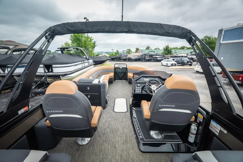 Slide: The Image of Interior view of 2026 Viaggio Diamante UWA 26 boat, featuring luxurious seating and modern dashboard. - 28