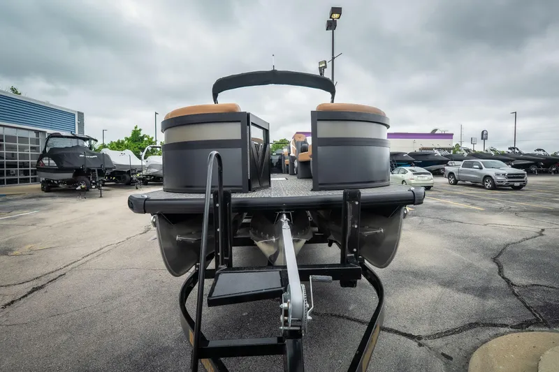 Slide: The Image of 2026 Viaggio Diamante UWA 26 pontoon boat in dealership parking lot. - 3