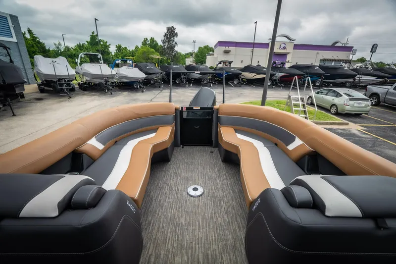 Slide: The Image of 2026 Viaggio Diamante UWA 26 boat interior with luxurious seating in a showroom. - 31