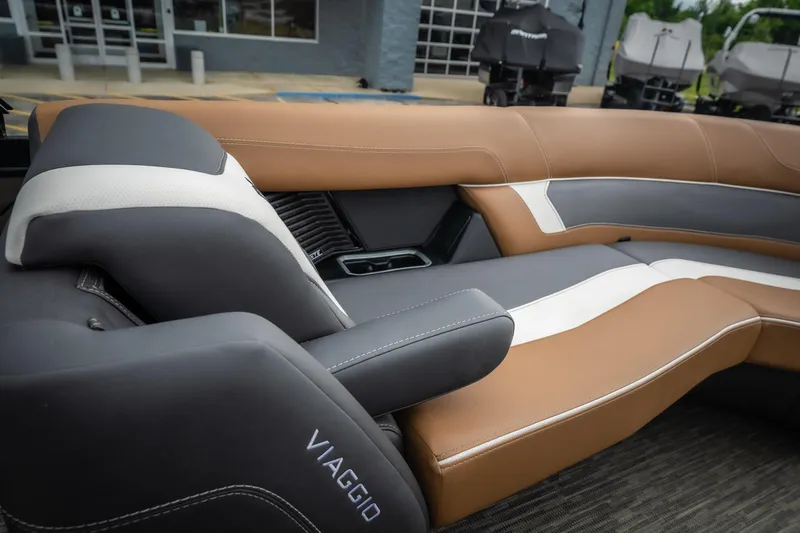 Slide: The Image of Luxurious interior seating of 2026 Viaggio Diamante UWA 26 boat, featuring elegant brown and gray upholstery. - 32