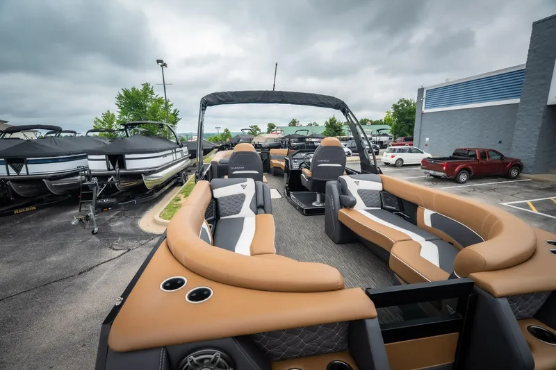 Slide: The Image of 2026 Viaggio Diamante UWA 26 pontoon boat with luxurious seating in a dealership lot. - 36
