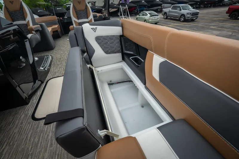 Slide: The Image of 2026 Viaggio Diamante UWA 26 boat interior with open storage compartment and luxurious seating. - 40