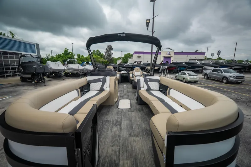 Slide: The Image of 2026 Viaggio D26U pontoon boat with spacious seating, displayed outdoors under cloudy skies. - 14