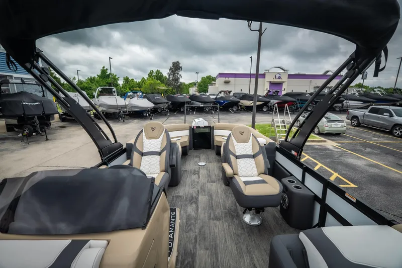 Slide: The Image of Luxurious 2026 Viaggio D26U boat interior with plush seating, parked in a dealership lot. - 18