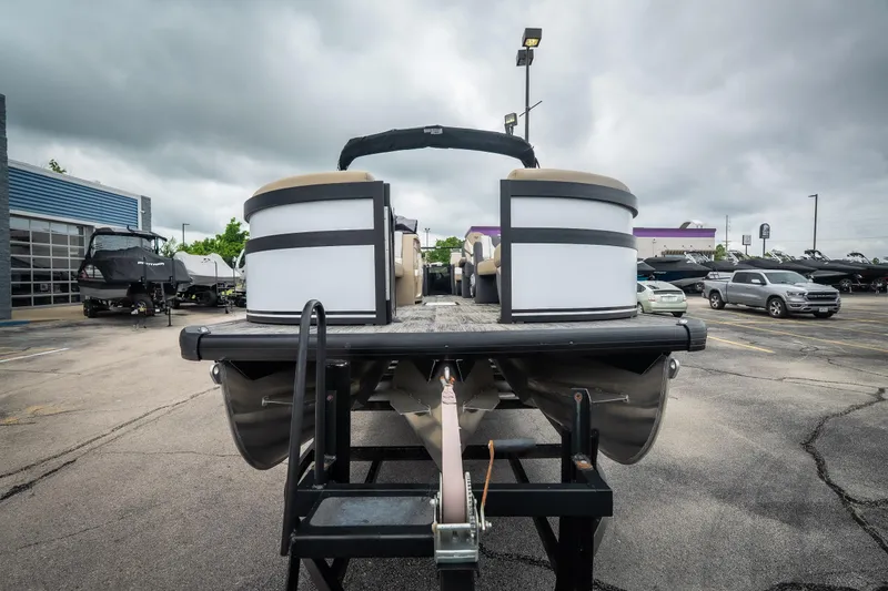Slide: The Image of 2026 Viaggio D26U pontoon boat on trailer in dealership parking lot. - 3