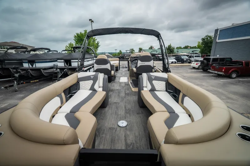 Slide: The Image of 2026 Viaggio D26U pontoon boat with luxurious seating and modern design in a dealership lot. - 30