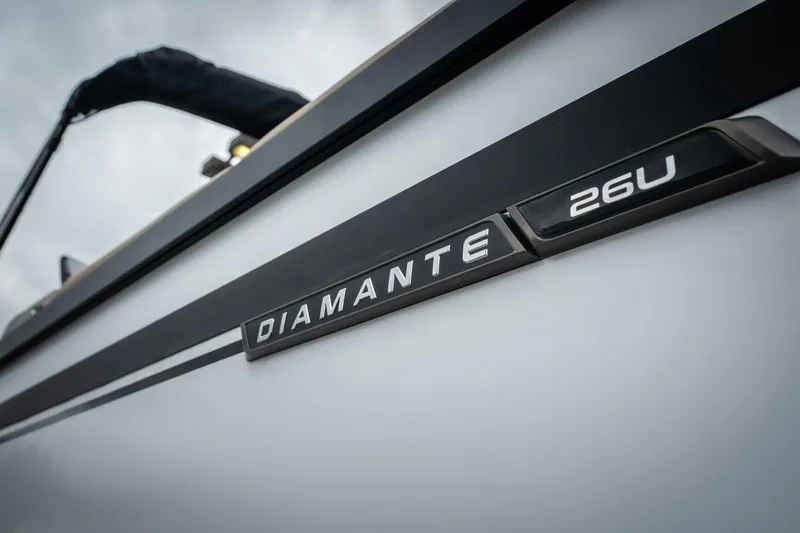 Slide: The Image of Close-up of 2026 Viaggio D26U boat with "Diamante 26U" branding. - 5