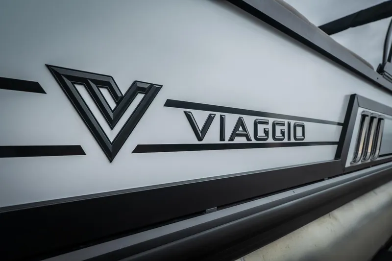 Slide: The Image of 2026 Viaggio D26U boat logo on sleek white and black exterior. - 7