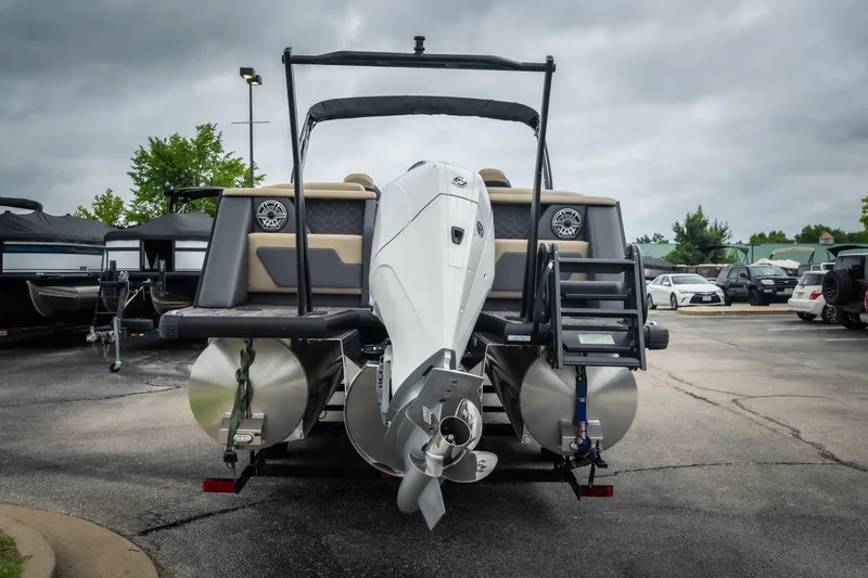 Slide: The Image of 2026 Viaggio D26U pontoon boat with powerful outboard motor in a parking lot. - 9