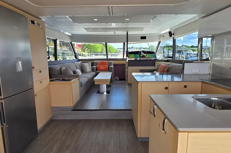 Slide: The Image of Luxurious interior of 2018 Fountaine Pajot Motor Yacht 44 with modern kitchen and spacious seating area. - 19