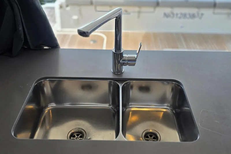 Slide: The Image of Stainless steel double sink with modern faucet on 2018 Fountaine Pajot Motor Yacht 44. - 22