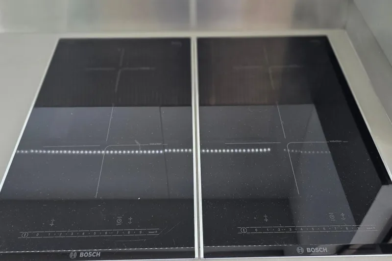 Slide: The Image of Modern Bosch induction cooktop on 2018 Fountaine Pajot Motor Yacht 44. - 23