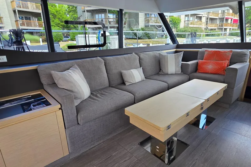 Slide: The Image of Luxurious interior of 2018 Fountaine Pajot Motor Yacht 44 with modern sofa and table. - 29