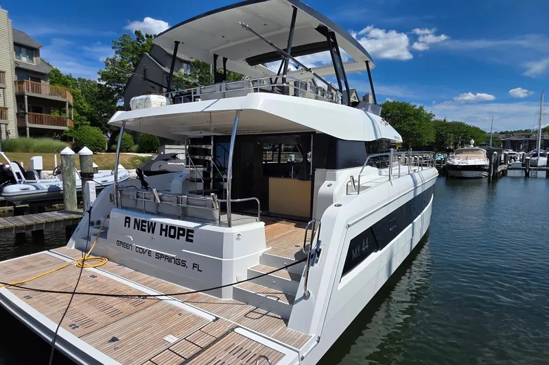 Slide: The Image of 2018 Fountaine Pajot Motor Yacht 44 docked, named "A New Hope," in Green Cove Springs, FL. - 3