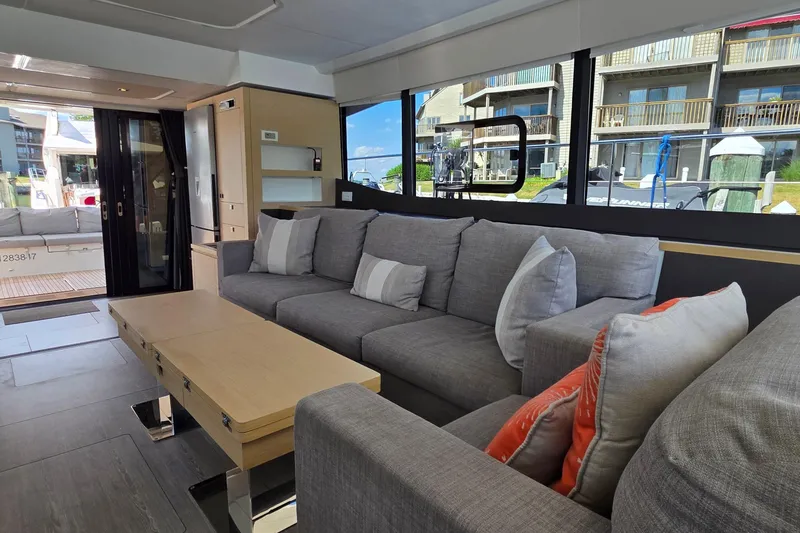 Slide: The Image of Luxurious interior of 2018 Fountaine Pajot Motor Yacht 44 with modern gray seating. - 30