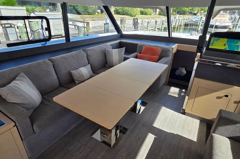 Slide: The Image of Luxurious interior of 2018 Fountaine Pajot Motor Yacht 44 with modern seating and table. - 33