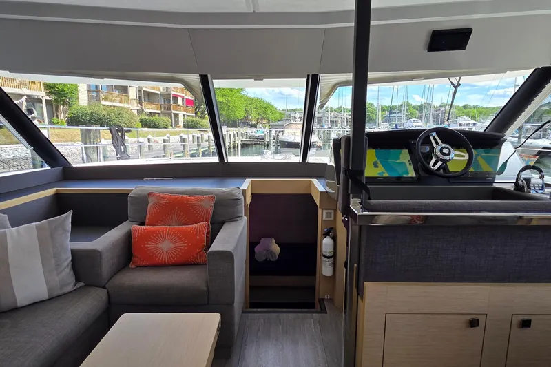 Slide: The Image of Interior of 2018 Fountaine Pajot Motor Yacht 44 with helm and seating area. - 34