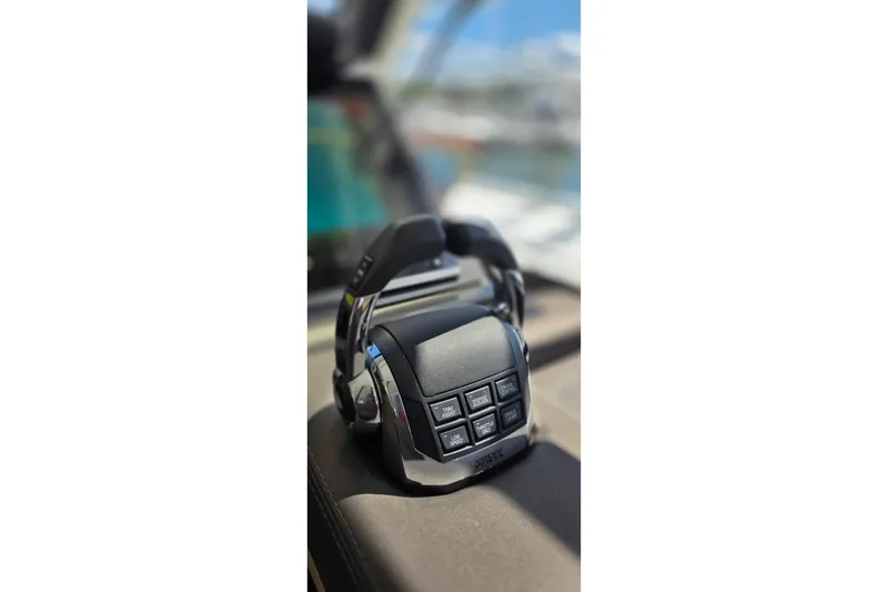 Slide: The Image of Control panel of a 2018 Fountaine Pajot Motor Yacht 44, featuring modern navigation controls. - 37