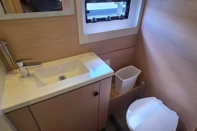Slide: The Image of Bathroom interior of 2018 Fountaine Pajot Motor Yacht 44, featuring sink and toilet. - 50