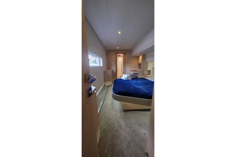 Slide: The Image of Luxurious cabin interior of 2018 Fountaine Pajot Motor Yacht 44 with cozy bed and modern design. - 61