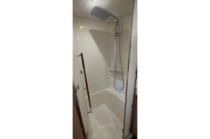 Slide: The Image of Shower area in 2018 Fountaine Pajot Motor Yacht 44, featuring modern fixtures and sleek design. - 66