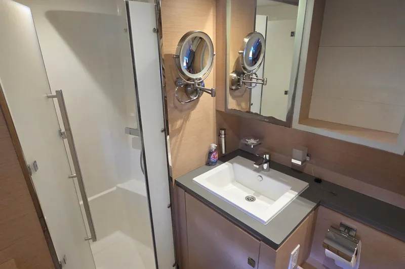 Slide: The Image of Modern bathroom on 2018 Fountaine Pajot Motor Yacht 44 with sleek fixtures and shower. - 68