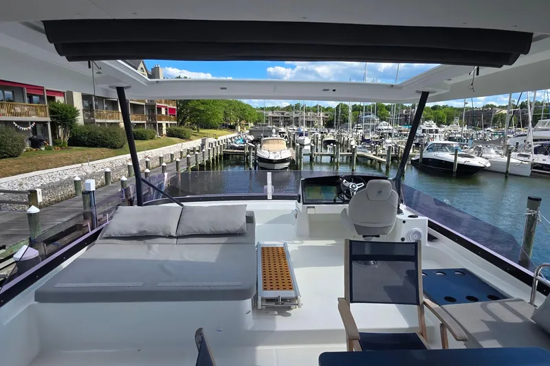 Slide: The Image of Luxurious 2018 Fountaine Pajot Motor Yacht 44 docked at a scenic marina. - 71