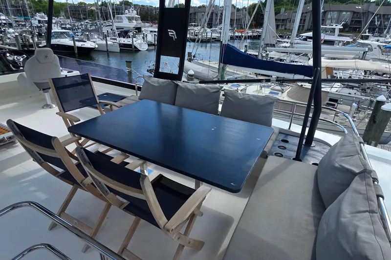Slide: The Image of Luxurious 2018 Fountaine Pajot Motor Yacht 44 with elegant outdoor seating area. - 72